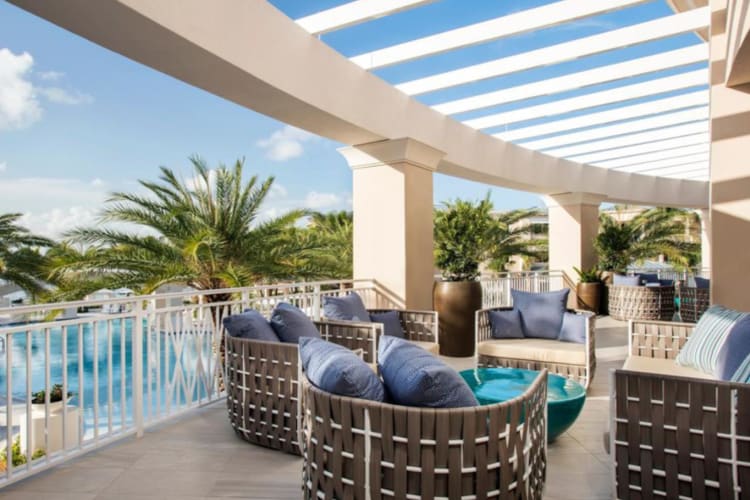 Outdoor seating with pool view